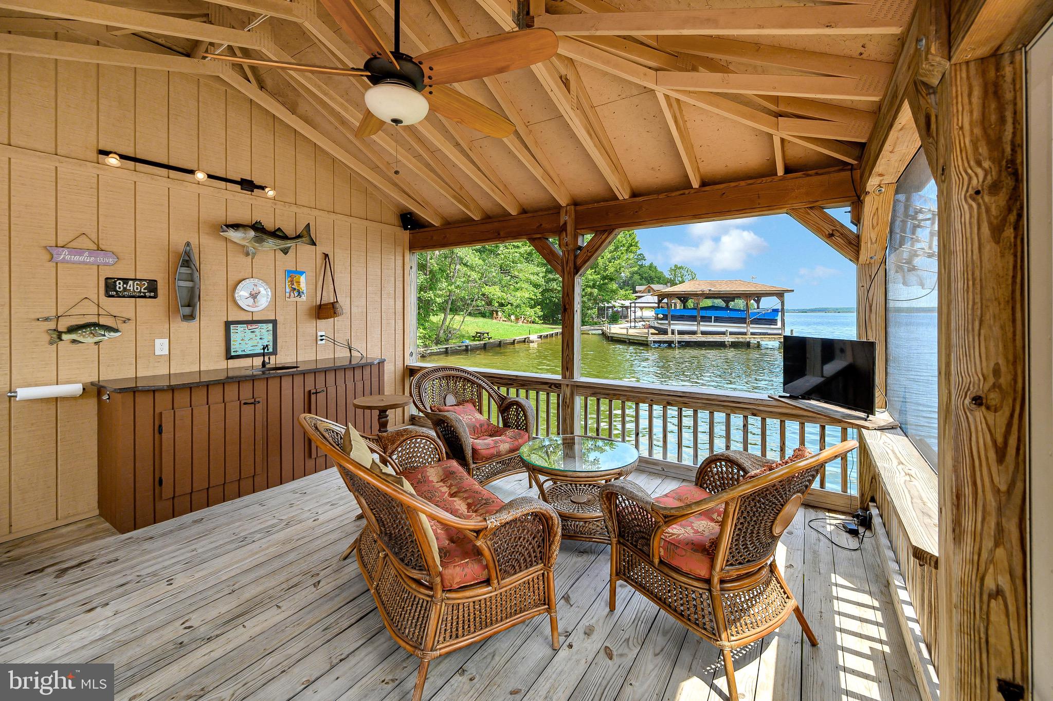 544 Plum Tree Road Bumpass, VA 23024 - Photo 29 of 43 Fabulous Screened Room at the Waterfront!