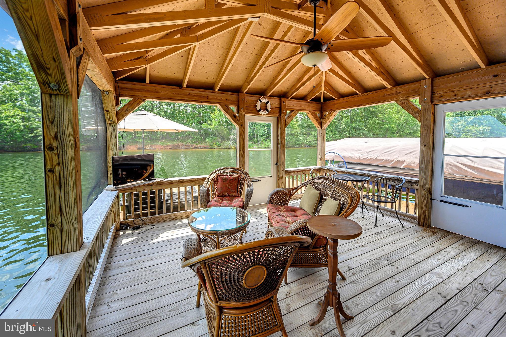 544 Plum Tree Road Bumpass, VA 23024 - Photo 31 of 43 Watch TV in the Screened Room at the WF!