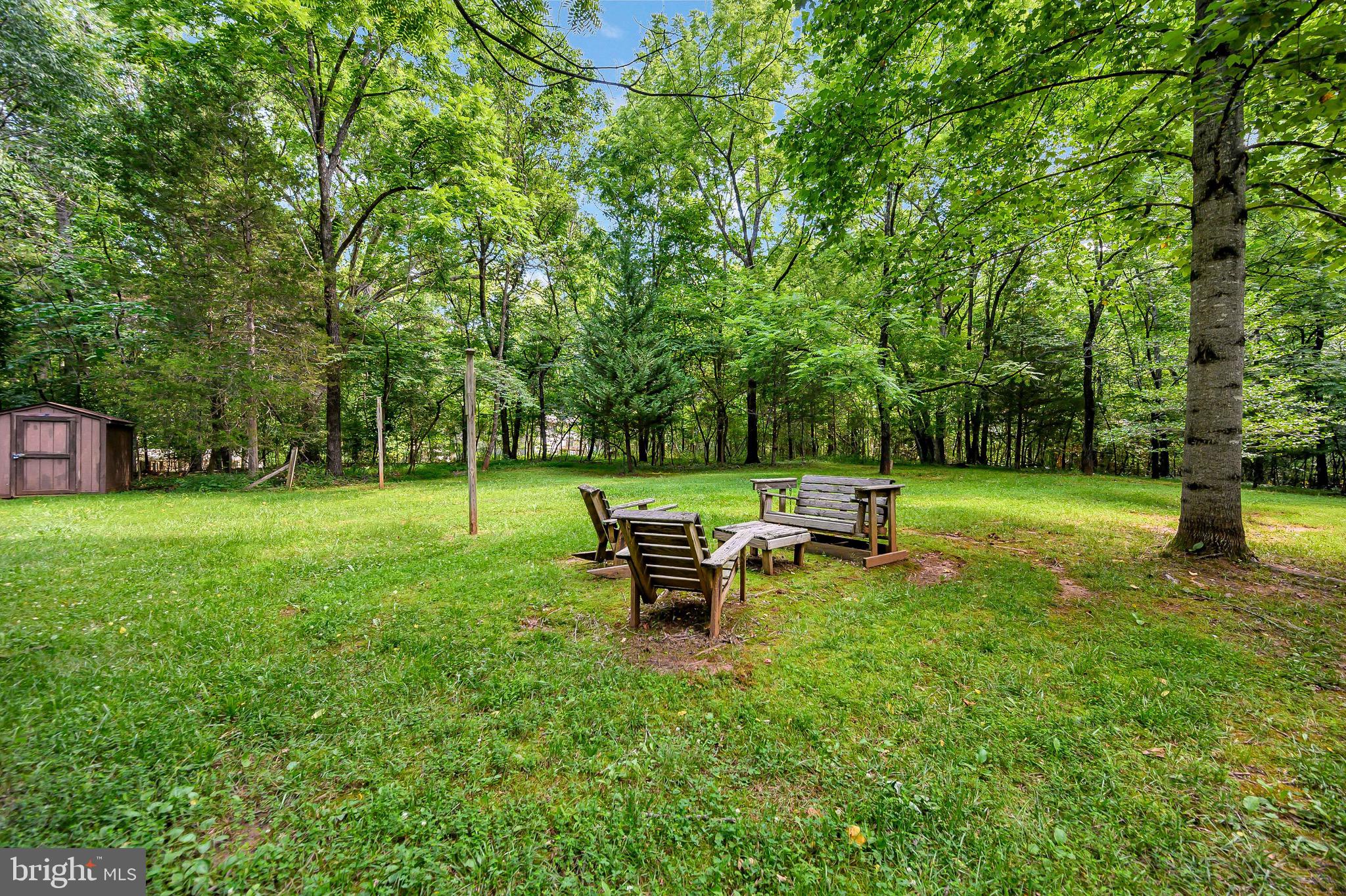 544 Plum Tree Road Bumpass, VA 23024 - Photo 33 of 43 Inviting outdoor fire pit