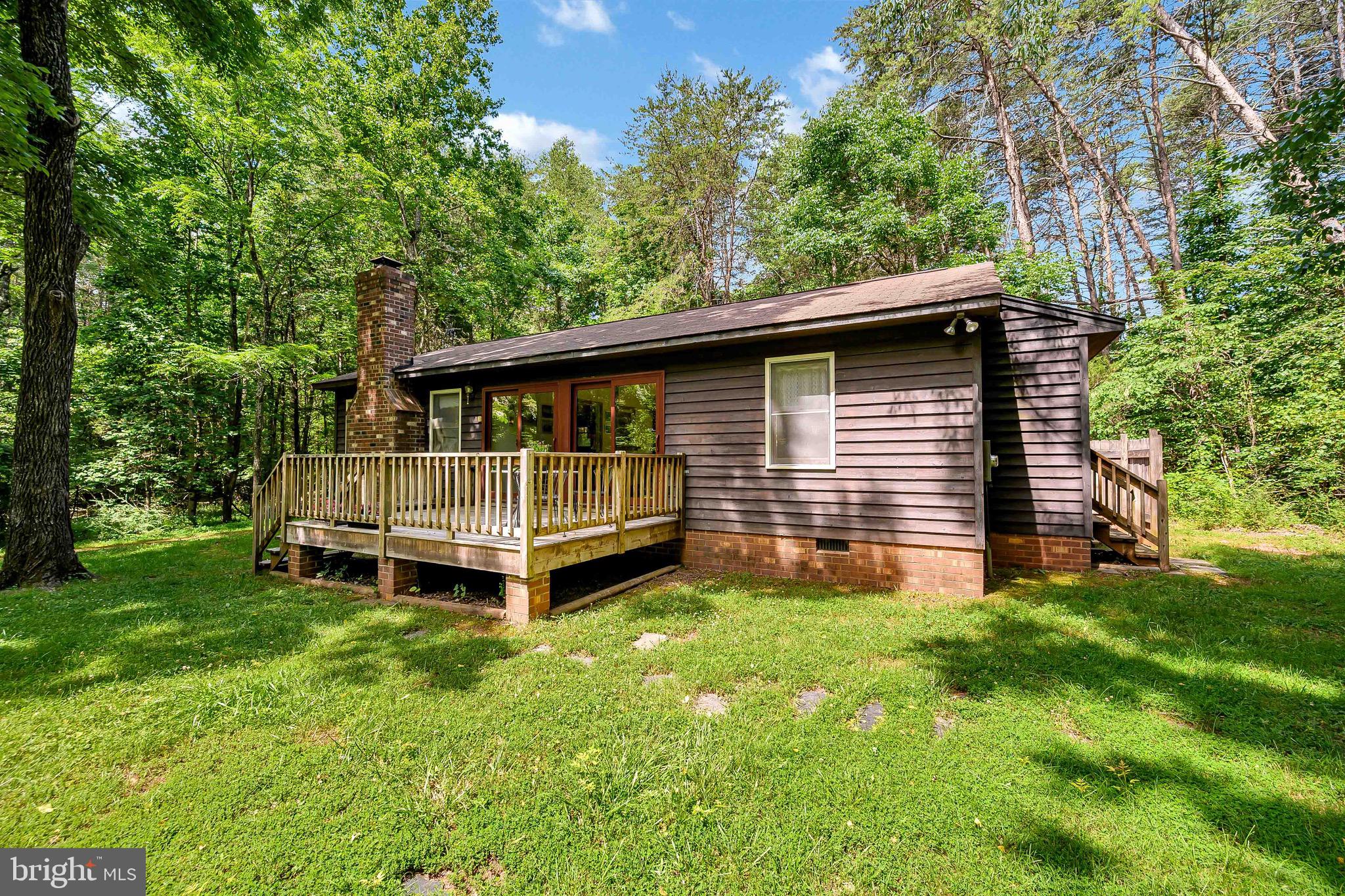 Very inviting deck and yard.