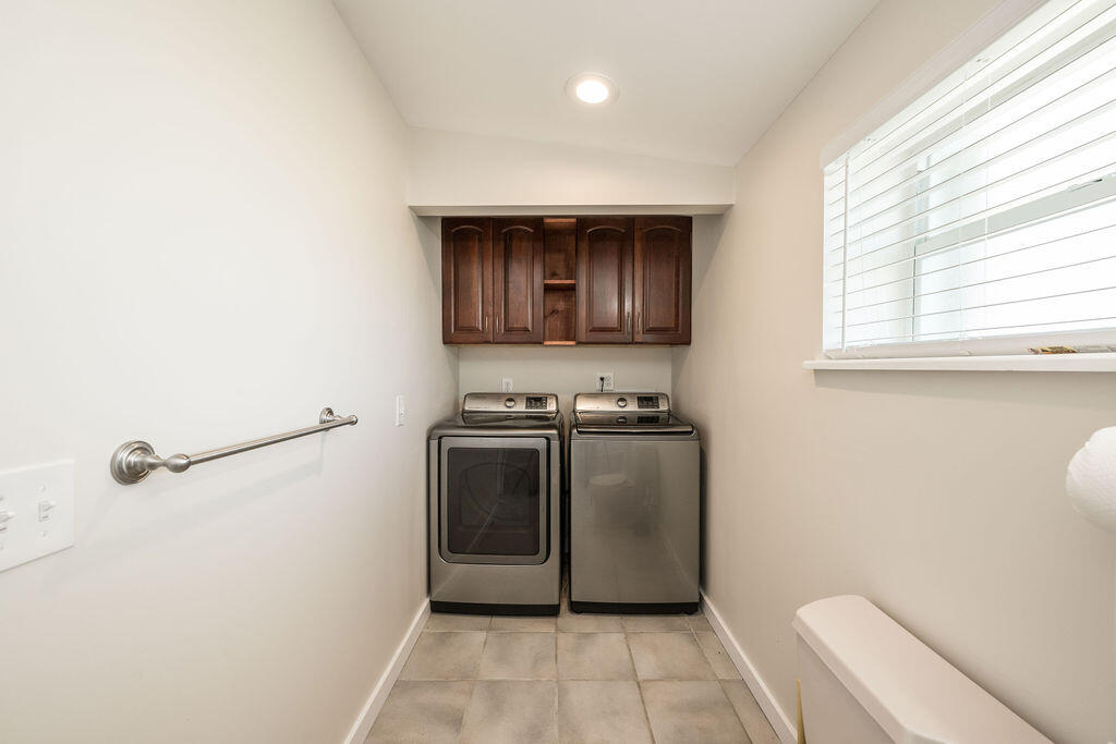 17279 Pine Tree Lane Sugarloaf, FL 33042 - Photo 27 of 33 a kitchen with a refrigerator and a stove