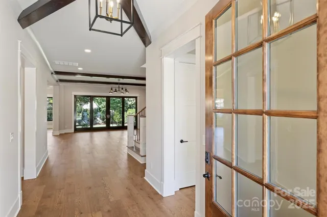 a view of a kitchen with a sink and a stove top oven