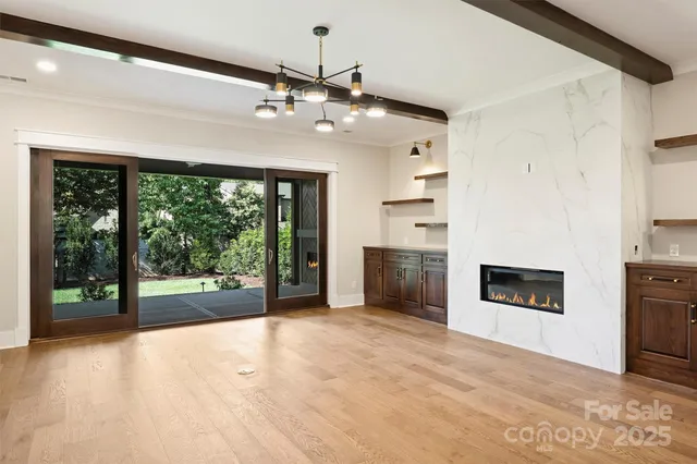 a kitchen with kitchen island a counter space a sink appliances and cabinets