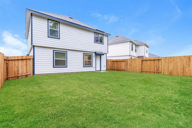 a front view of house with yard