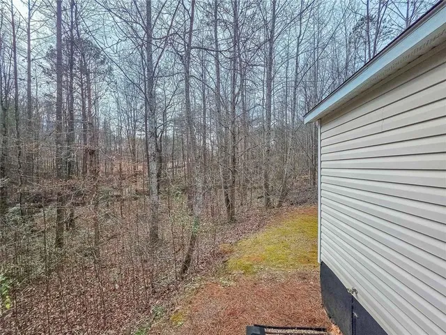 a view of a backyard of the house