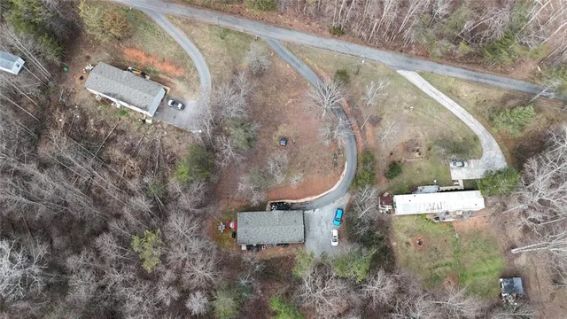 an aerial view of residential house with outdoor space