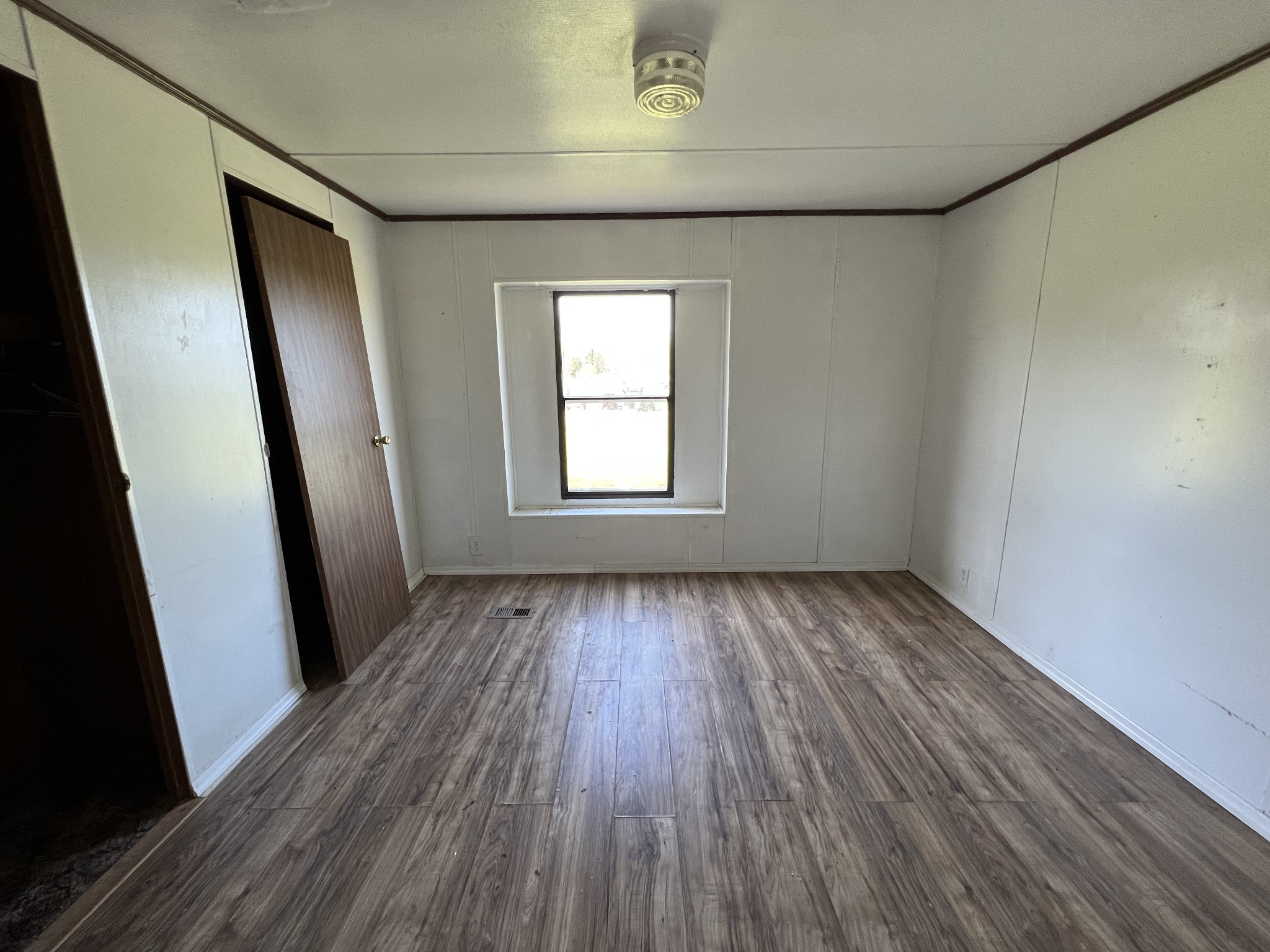 4225 Jernigan Road White House, TN 37188 - Photo 6 of 15 an empty room with wooden floor and window