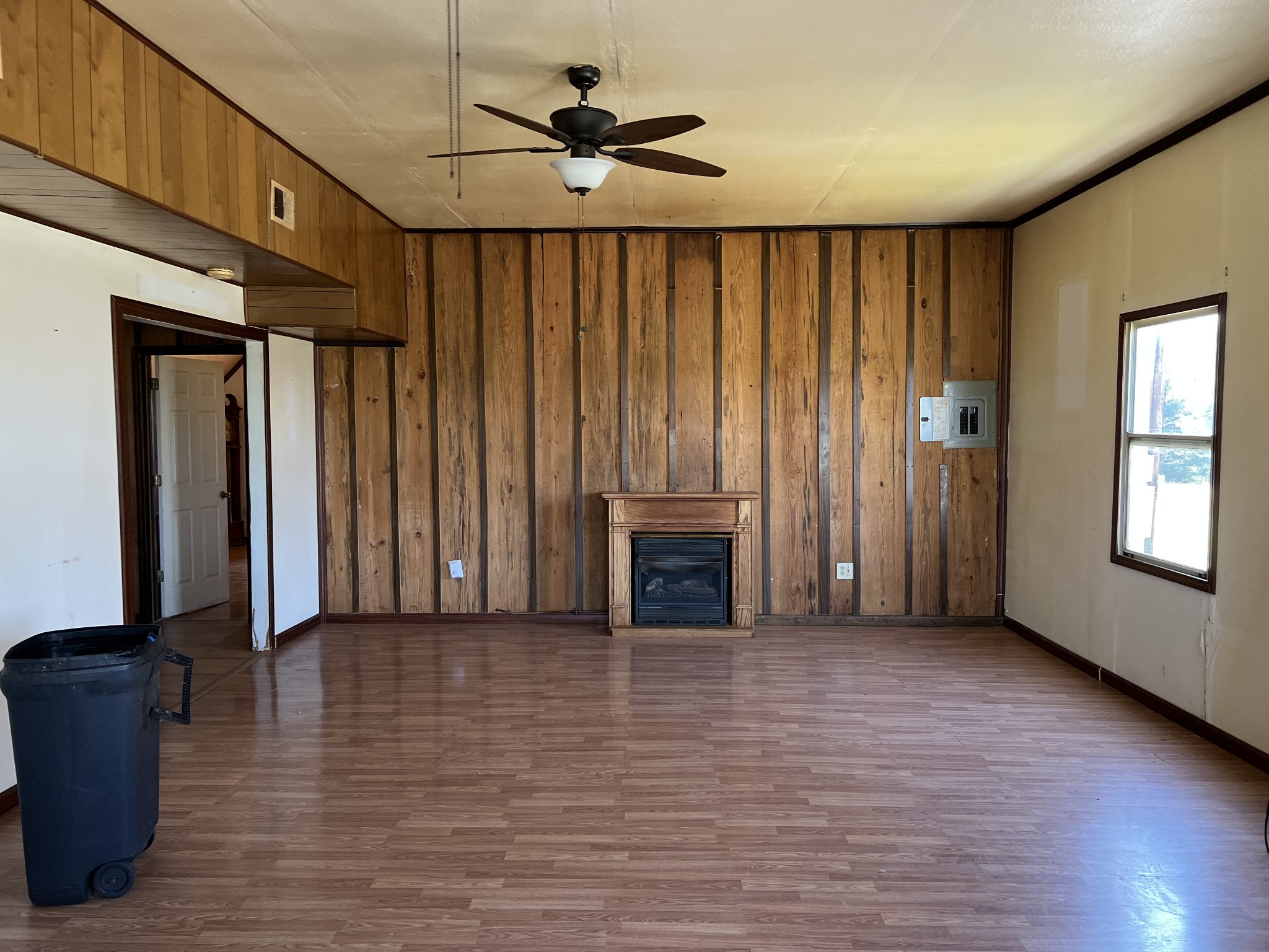 4225 Jernigan Road White House, TN 37188 - Photo 10 of 15 a view of a livingroom with wooden floor a ceiling fan and a window