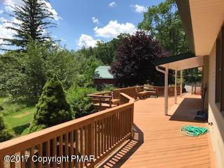 197 Devils Hole Road Cresco, PA 18326 - Photo 11 of 27 a view of a balcony with wooden floor