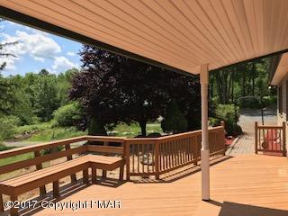 197 Devils Hole Road Cresco, PA 18326 - Photo 12 of 27 a view of a two chairs in the balcony