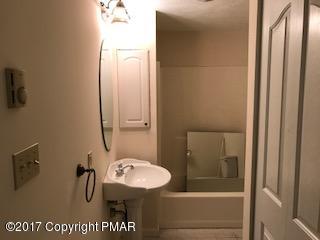 197 Devils Hole Road Cresco, PA 18326 - Photo 18 of 27 a bathroom with a sink a toilet and shower