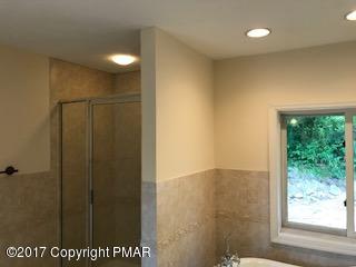 197 Devils Hole Road Cresco, PA 18326 - Photo 23 of 27 a view of an empty room with a window
