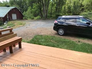 197 Devils Hole Road Cresco, PA 18326 - Photo 5 of 27 a view of a car parked front of a house