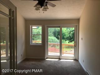 197 Devils Hole Road Cresco, PA 18326 - Photo 6 of 27 a view of an empty room with a window