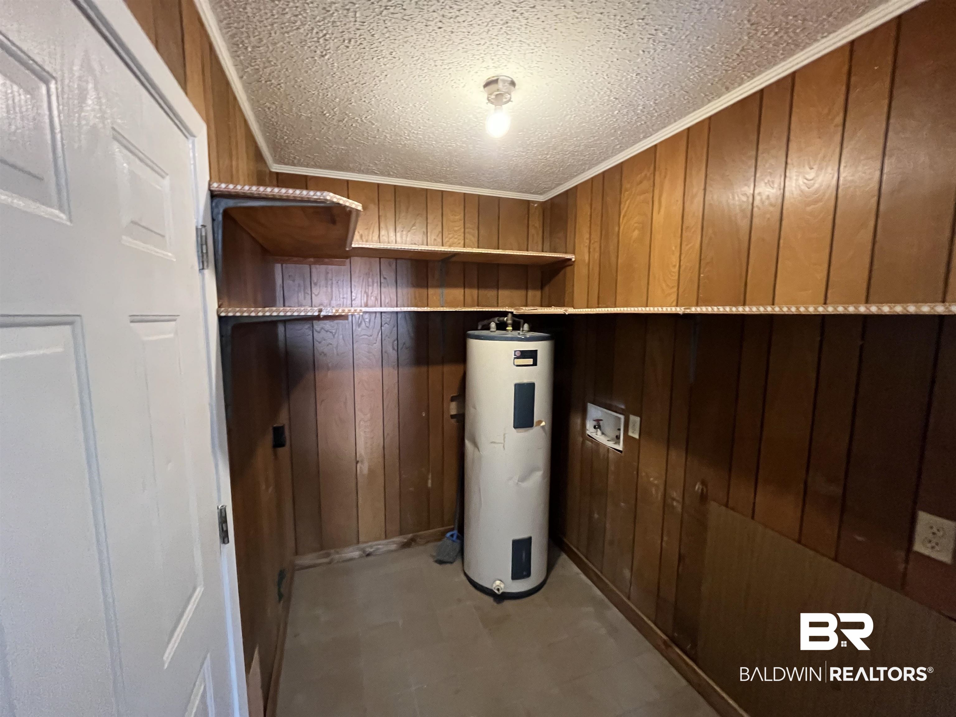 103 Roadway Street Brewton, AL 36426 - Photo 13 of 13 Utilities featuring water heater