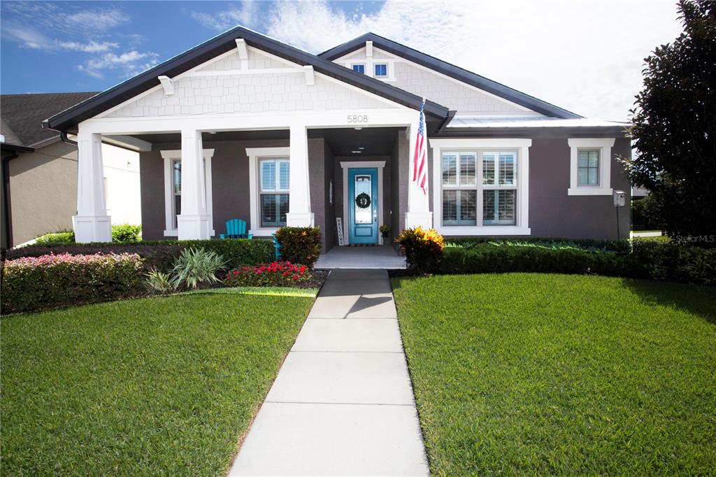 5808 Esker Falls Lane Lithia, FL 33547 - Photo 1 of 53 a front view of a house with a yard