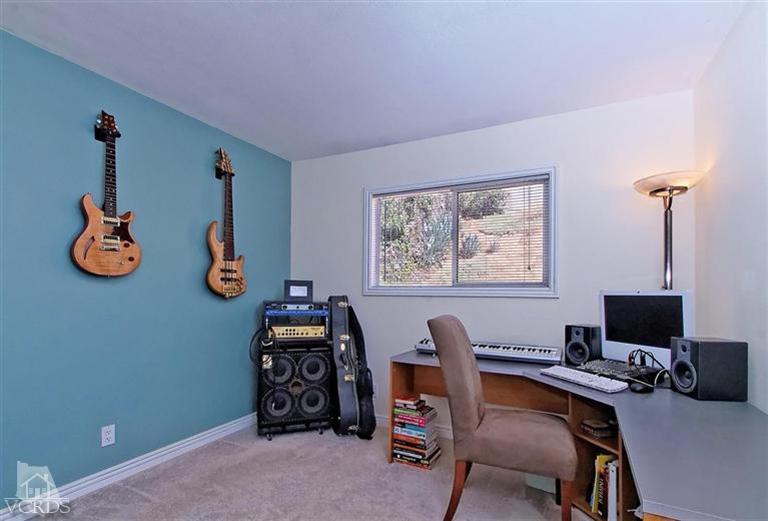 888 Appleton Road Simi Valley, CA 93065 - Photo 11 of 30 a view of a workspace with furniture and a window