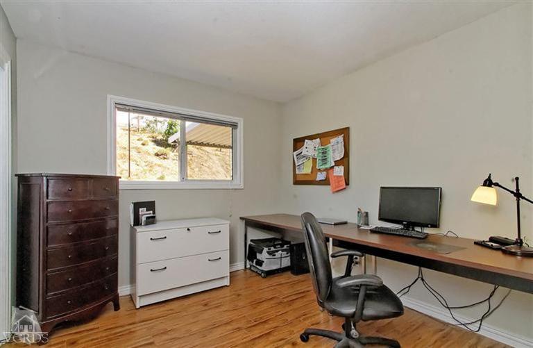 888 Appleton Road Simi Valley, CA 93065 - Photo 12 of 30 a view of a workspace with furniture and a window