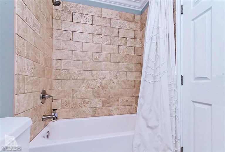 888 Appleton Road Simi Valley, CA 93065 - Photo 16 of 30 a bathroom with a bathtub