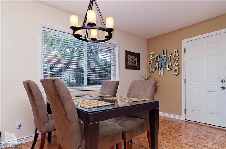 888 Appleton Road Simi Valley, CA 93065 - Photo 17 of 30 a view of a dining room with furniture
