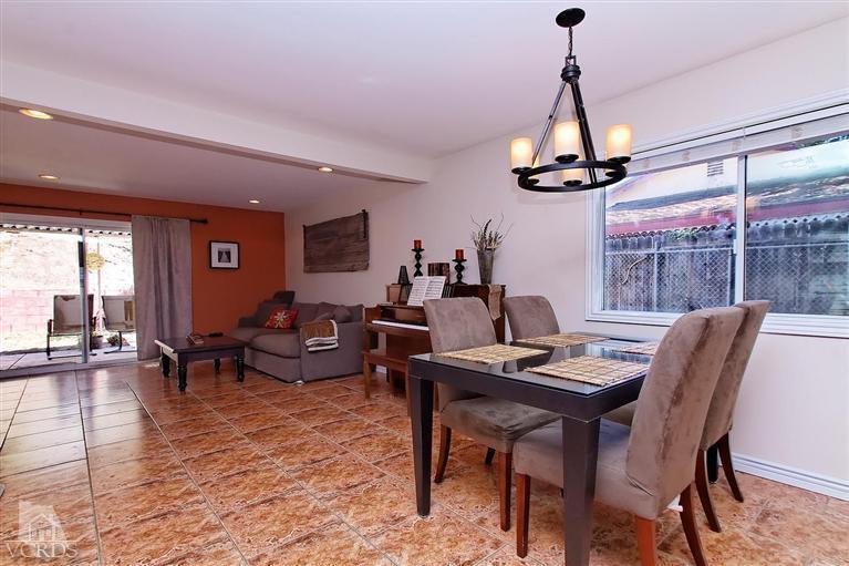 888 Appleton Road Simi Valley, CA 93065 - Photo 23 of 30 a living room with furniture and a floor to ceiling window