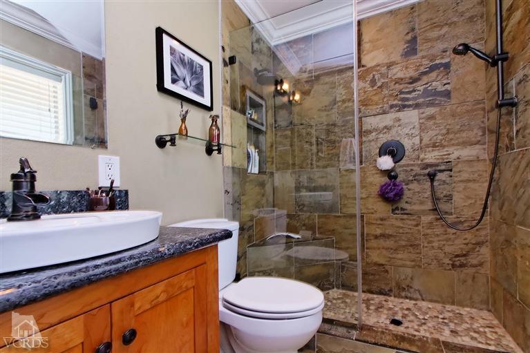 888 Appleton Road Simi Valley, CA 93065 - Photo 5 of 30 a bathroom with a sink a toilet and shower