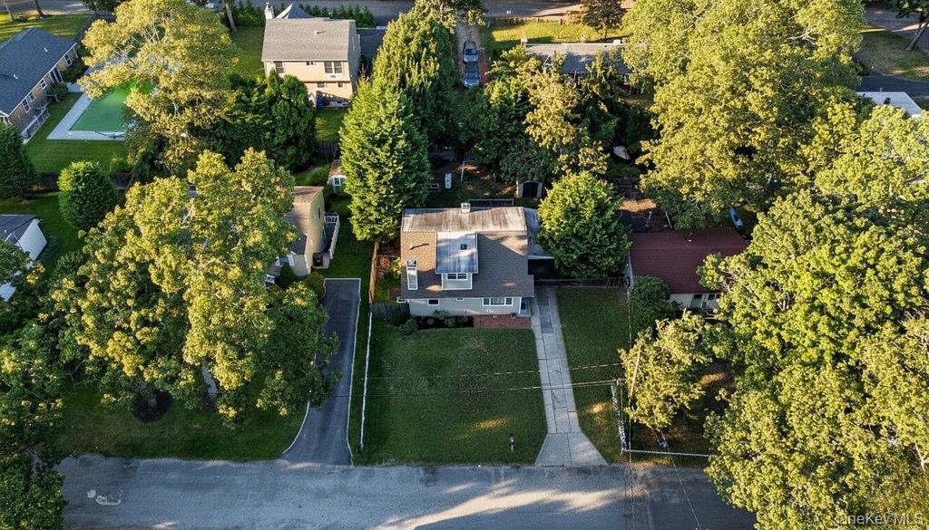 5 Liberty Street Hampton Bays, NY 11946 - Photo 17 of 17 an aerial view of a house