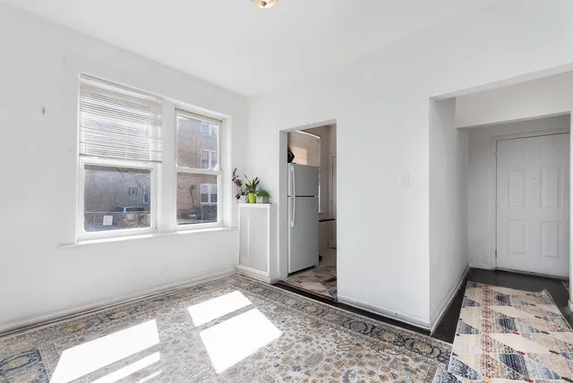 a view of an empty room and window