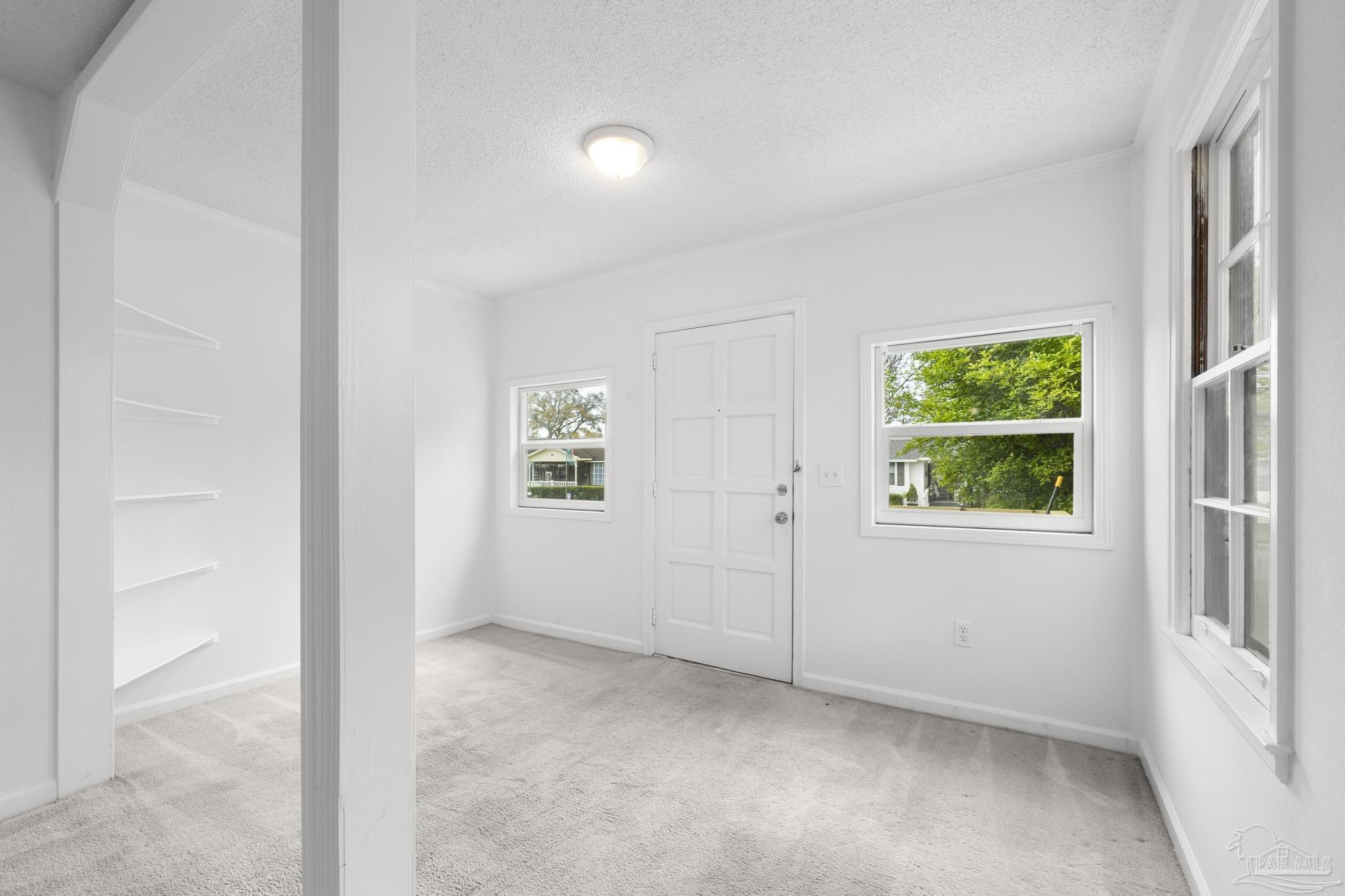 208 Berry Road Pensacola, FL 32507 - Photo 10 of 41 an empty room with windows