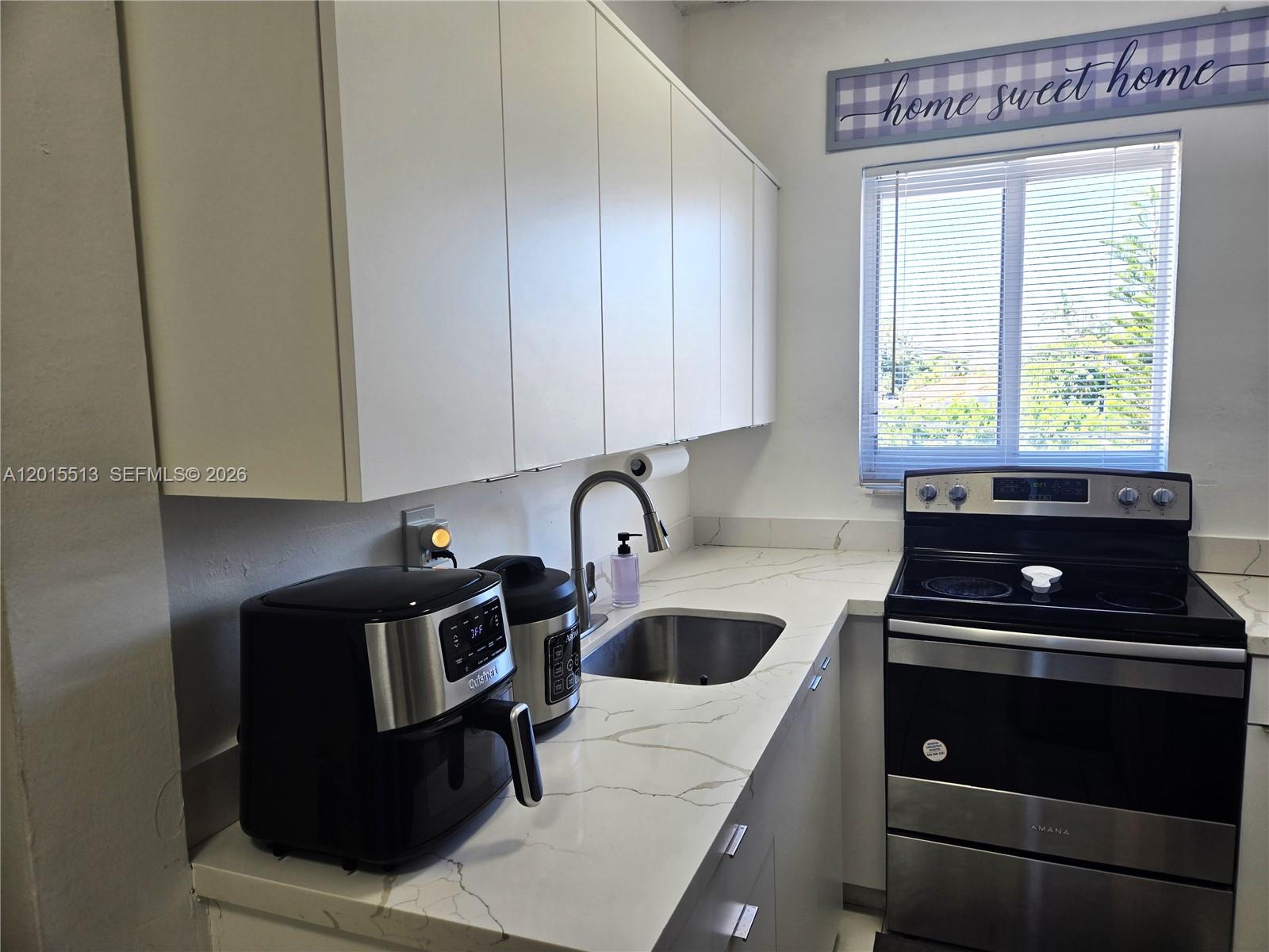 384 Tamiami Canal Road, Unit 1 Miami, FL 33144 - Photo 4 of 14 Photo 4