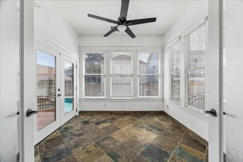 an empty room with windows