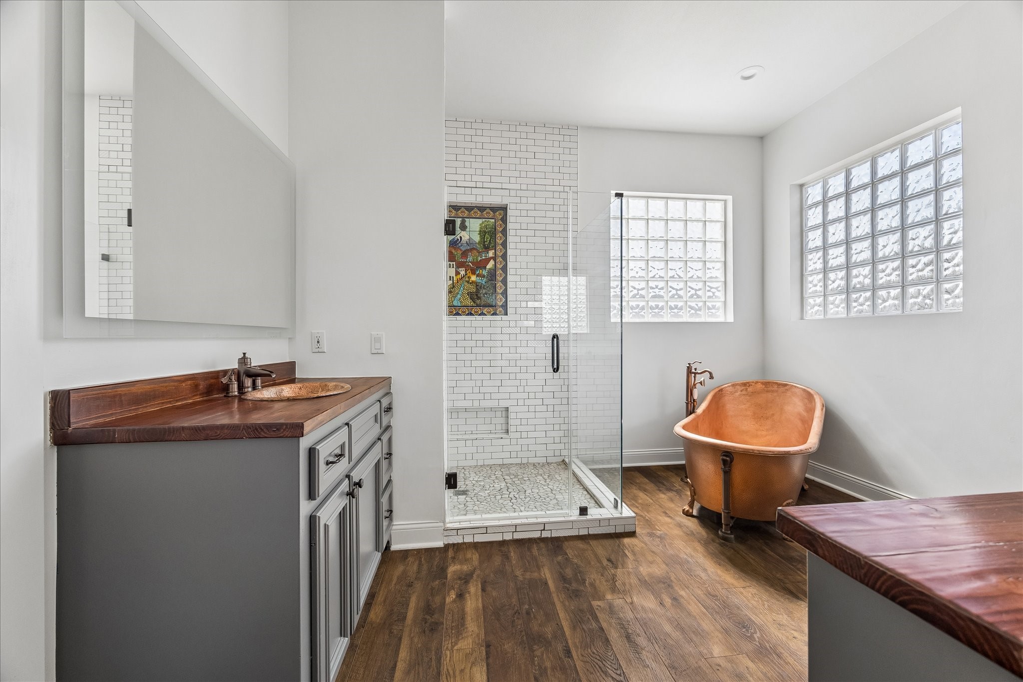 1408 West 23rd Street Houston, TX 77008 - Photo 28 of 39 a bathroom with a granite countertop toilet sink and mirror