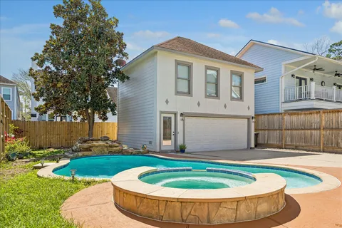a front view of a house with garage