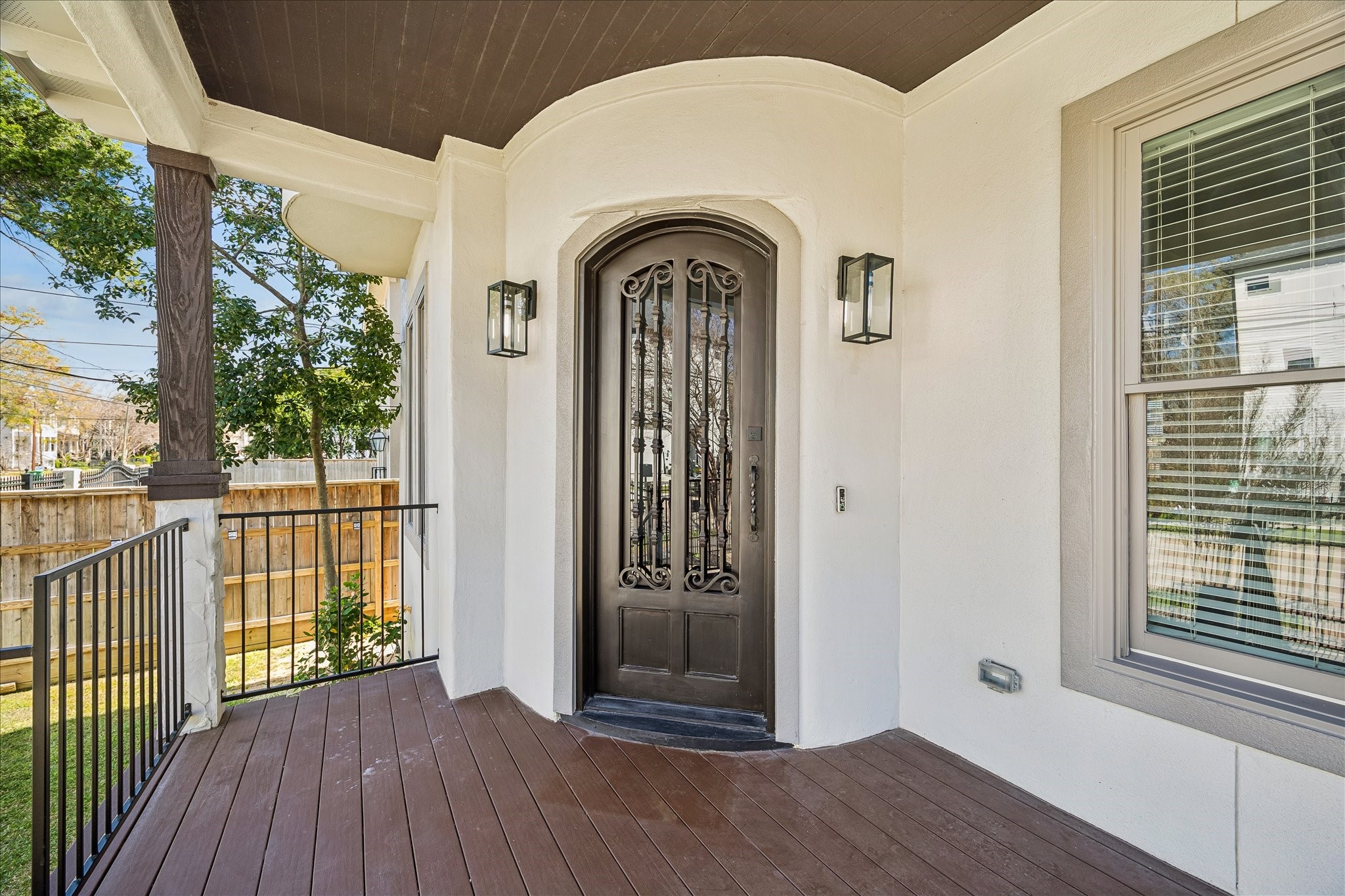 1408 West 23rd Street Houston, TX 77008 - Photo 6 of 39 a view of a wooden door with a balcony