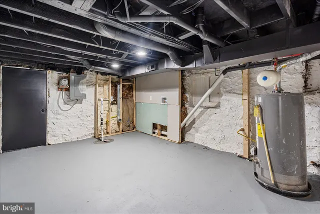 a front view of a residential apartment building with a yard