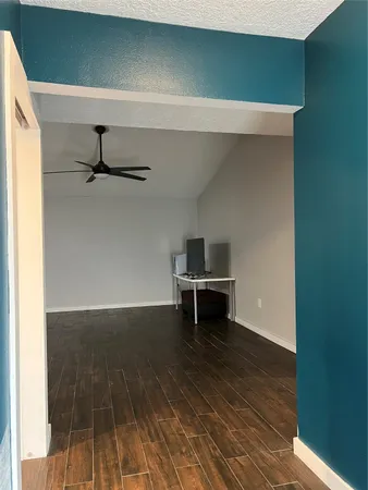 a view of livingroom with furniture and wooden floor