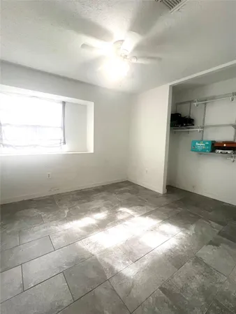 a view of a kitchen with a sink and a cabinets