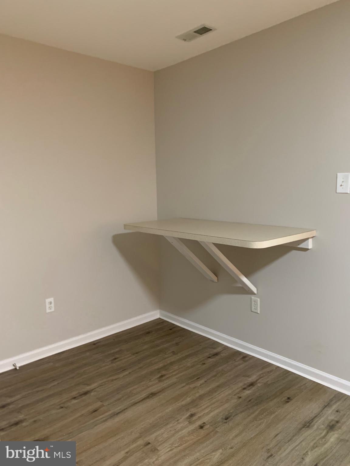 114 Sentry Ridge Smithsburg, MD 21783 - Photo 53 of 60 a view of an empty room with wooden floor