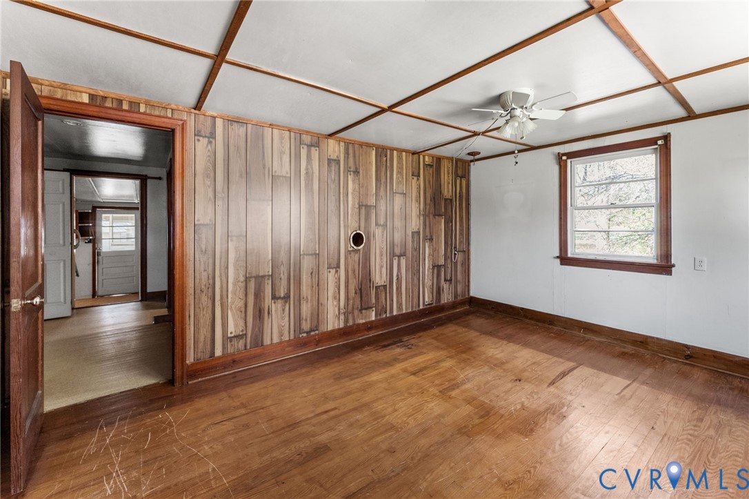 19161 Hollowing Creek Road Beaverdam, VA 23015 - Photo 19 of 27 a view of a room with wooden floor and windows