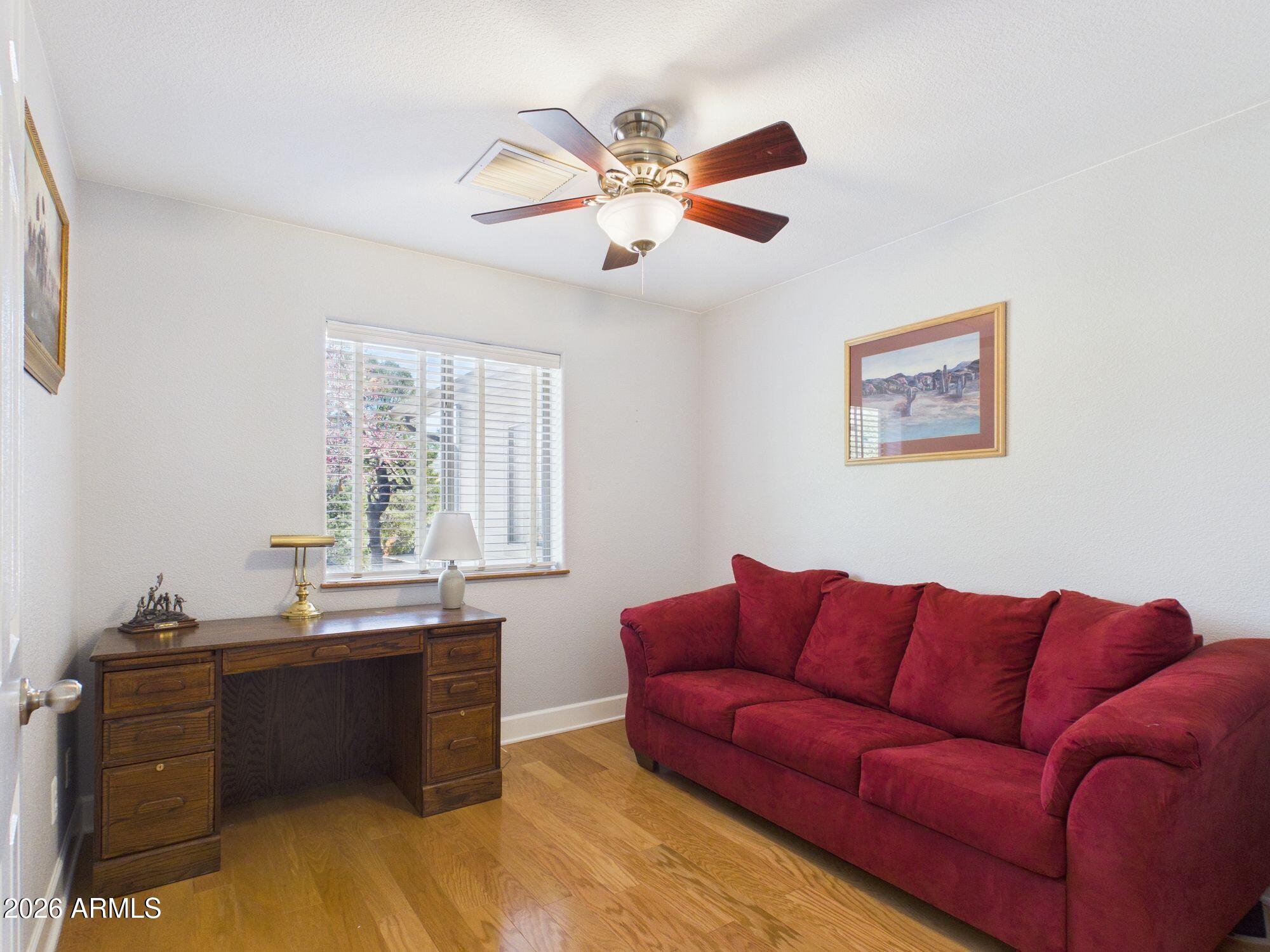 1104 North Rhone Circle Payson, AZ 85541 - Photo 11 of 39 a living room with furniture and a window