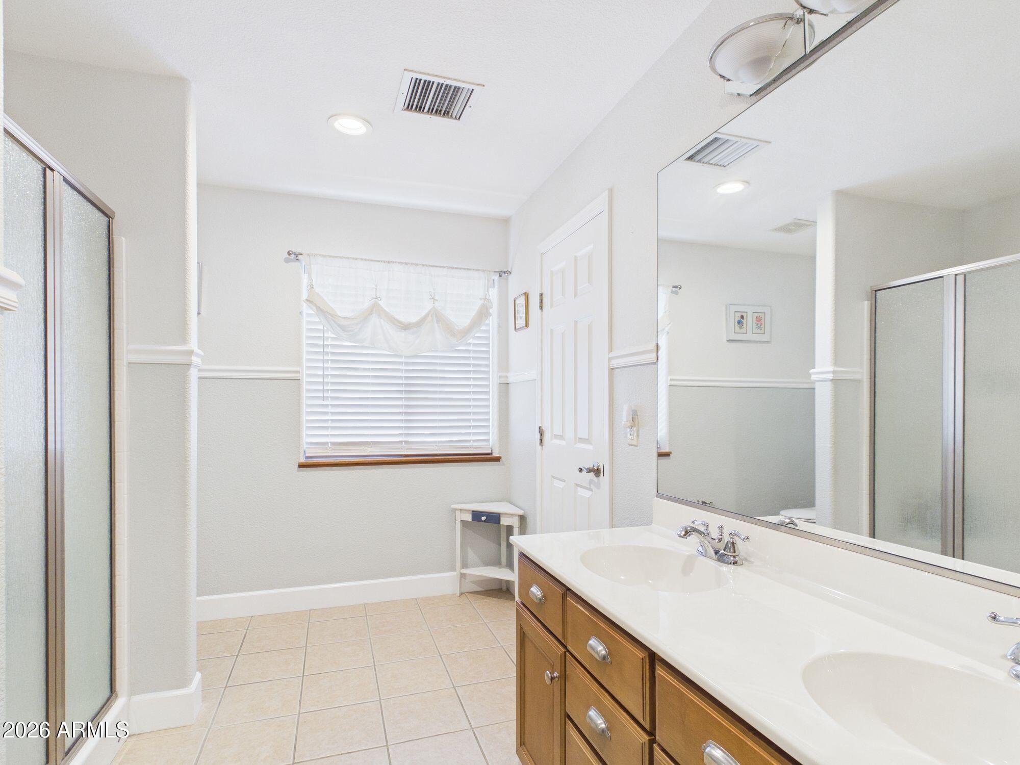 1104 North Rhone Circle Payson, AZ 85541 - Photo 14 of 39 a bathroom with a sink and a mirror