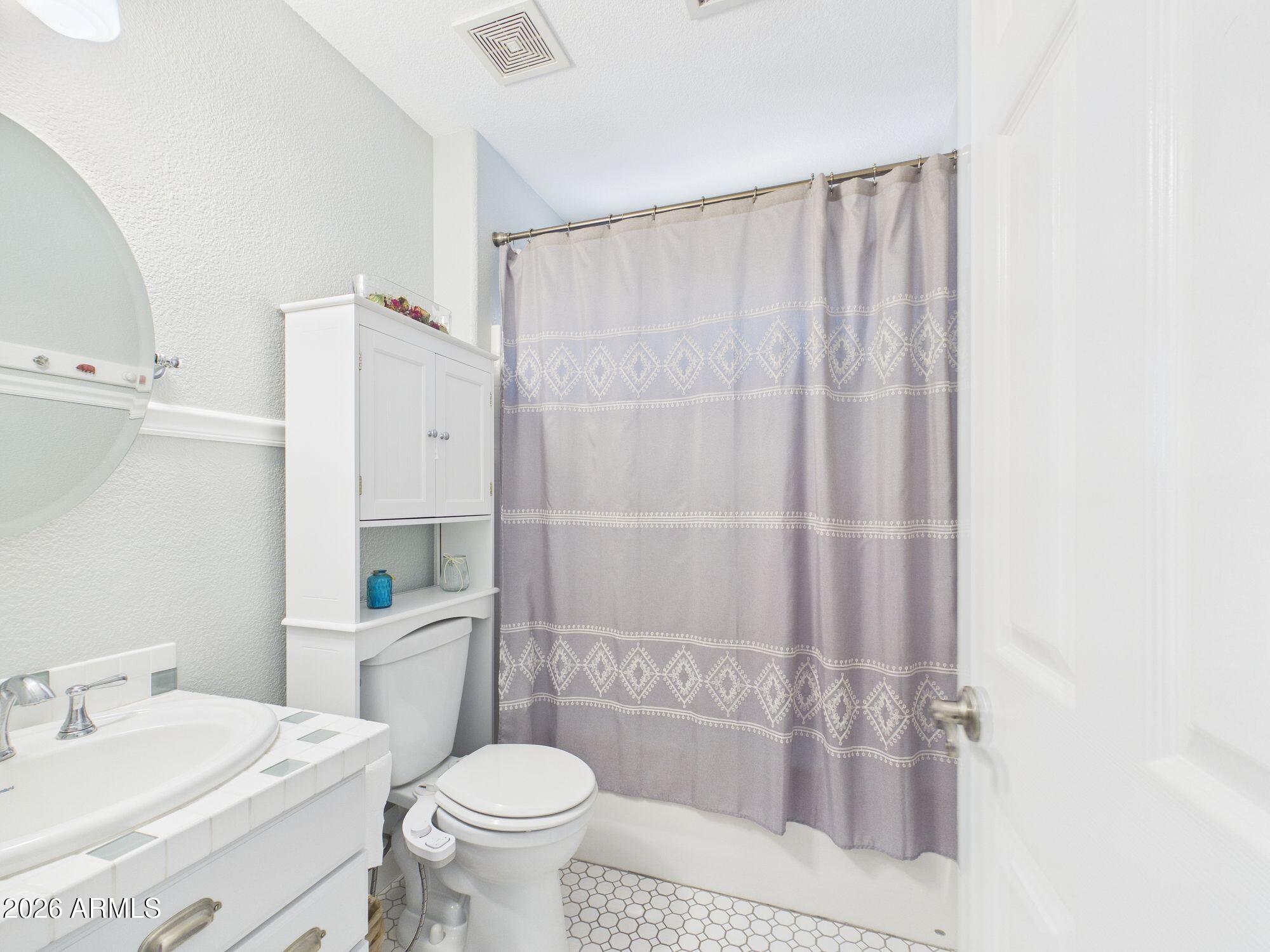 1104 North Rhone Circle Payson, AZ 85541 - Photo 17 of 39 a bathroom with a sink toilet and shower