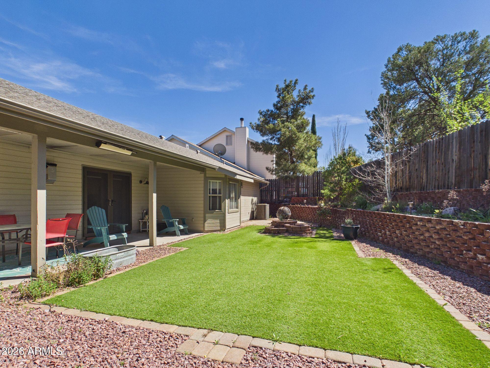 1104 North Rhone Circle Payson, AZ 85541 - Photo 22 of 39 a view of a house with a yard patio and swimming pool