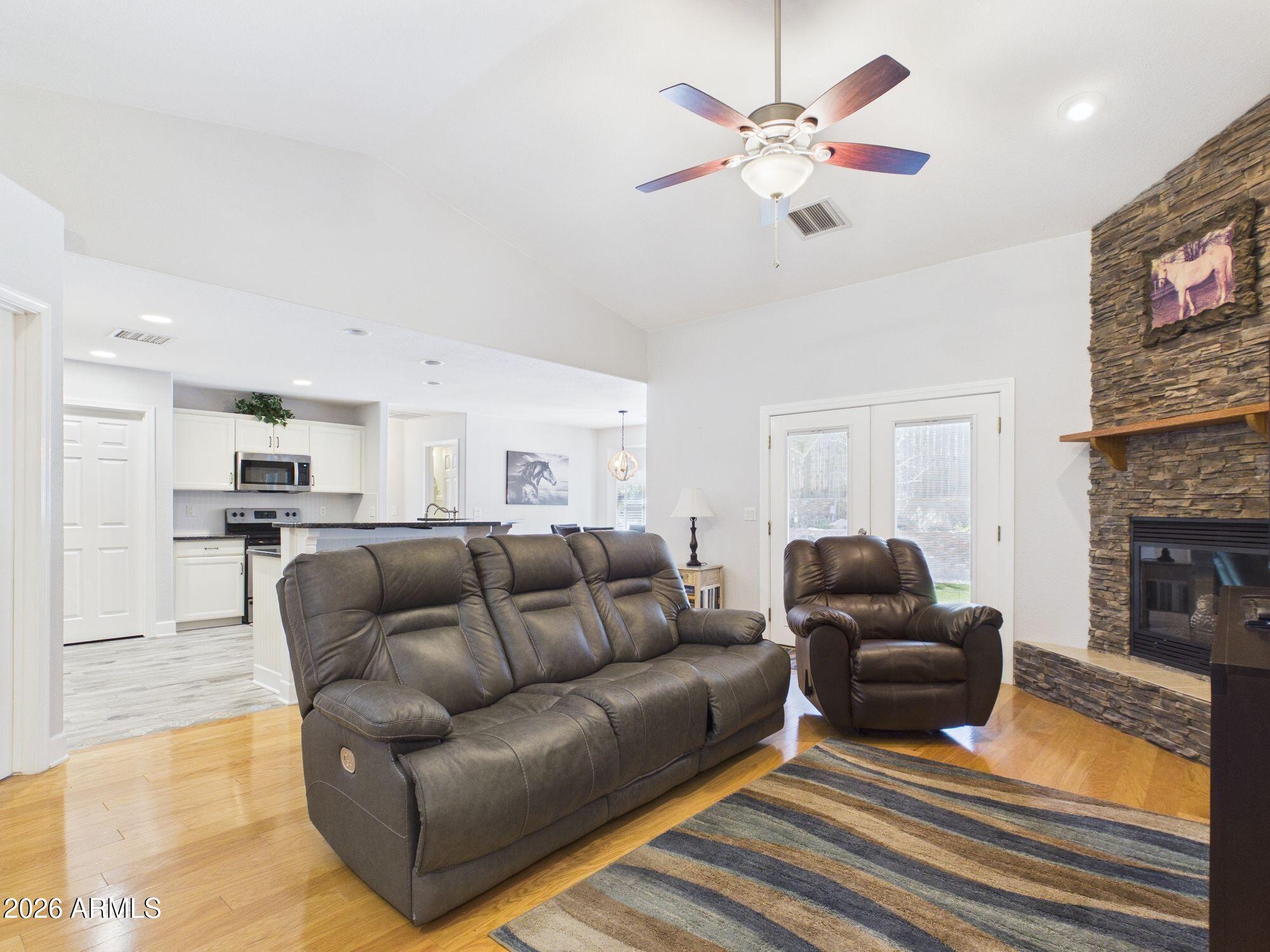 1104 North Rhone Circle Payson, AZ 85541 - Photo 6 of 39 a living room with furniture and a fireplace