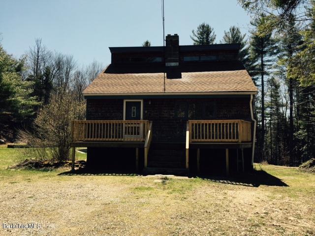 117 Middlefield Road Peru, MA 01235 - Photo 1 of 18 a view of a house with a yard