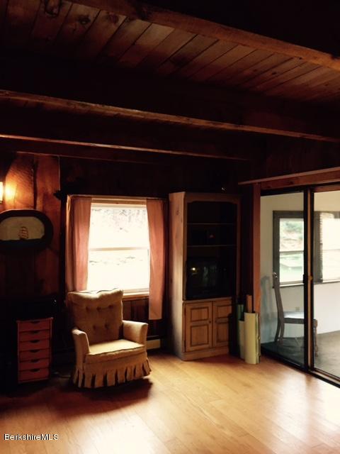 117 Middlefield Road Peru, MA 01235 - Photo 6 of 18 a living room with furniture and a window