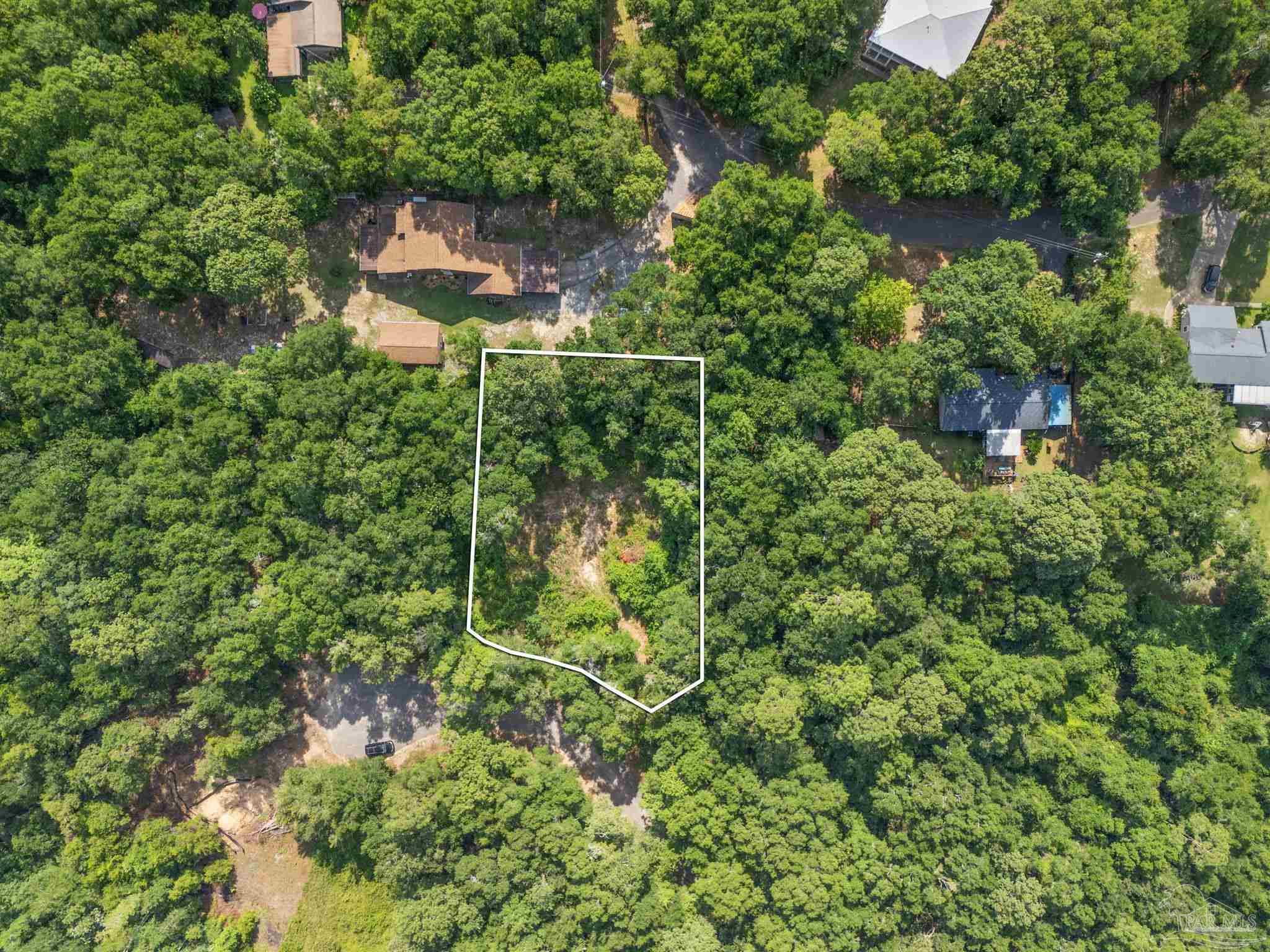 4948 Timothy Twitchell Drive Milton, FL 32583 - Photo 1 of 20 an aerial view of residential house with an outdoor space