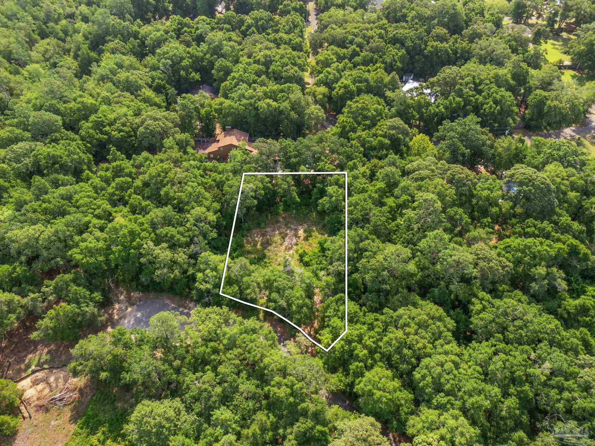 4948 Timothy Twitchell Drive Milton, FL 32583 - Photo 6 of 20 a view of a garden