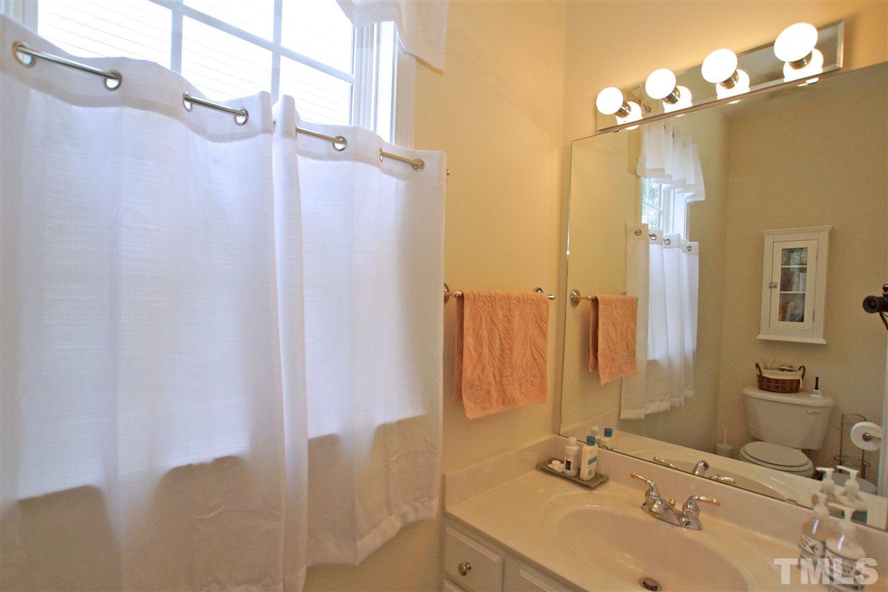 7540 Silver View Lane Raleigh, NC 27613 - Photo 17 of 29 Half bath is on main level of house.