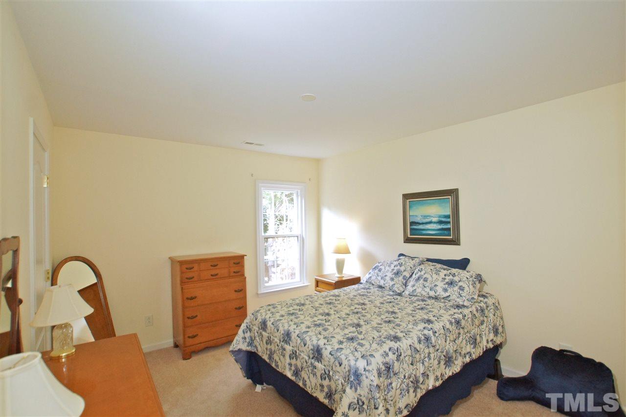 7540 Silver View Lane Raleigh, NC 27613 - Photo 19 of 29 Neutral color palette continues throughout bedrooms.